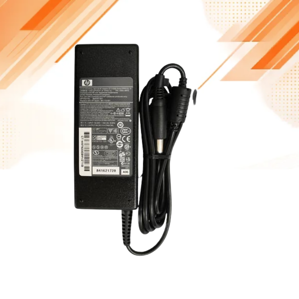 HP Centrino 90W laptop charger plugged into laptop